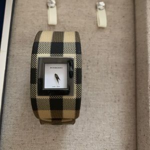Woman’s Burberry cuff watch
